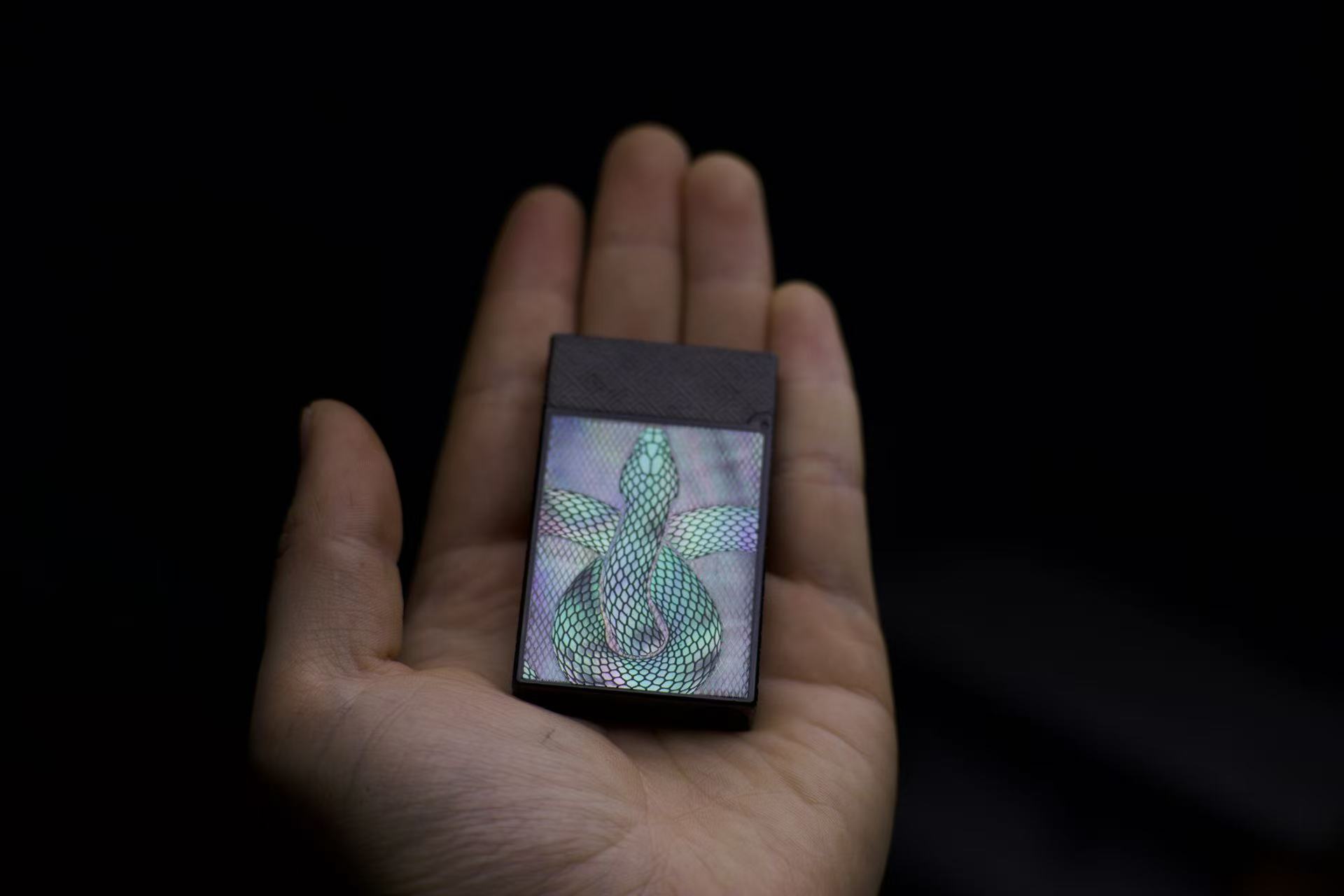 Display device — serpent coiled